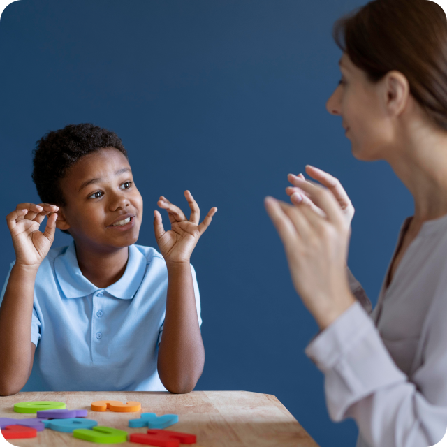 Speech and language pathologist giving speech therapy to a middle schooler